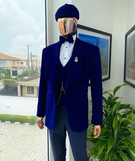 An admiral blue “peaky blinders” soaked Italian velvet shawl lapel suit
