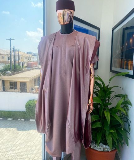 A classic light burgundy “kagbada”, Senator kaftan, burgundy round hat And sokoto