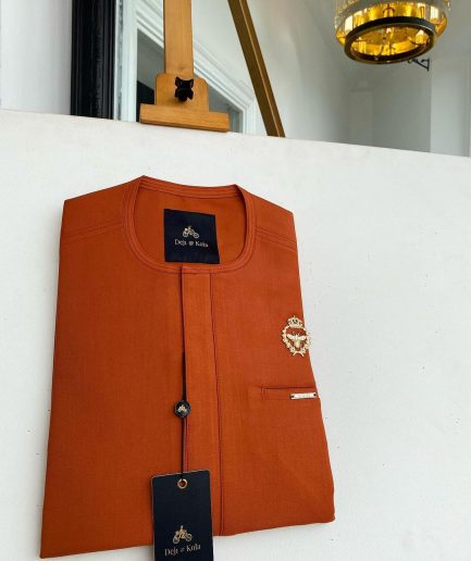A Salamander orange, tiny flap with a gold queen bee crown details African traditional senator Kaftan native