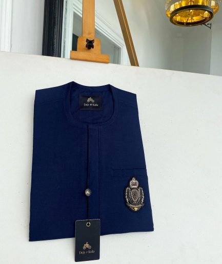 A Navy blue front flap with an Indian hand embroidery patch details African traditional senator kaftan native