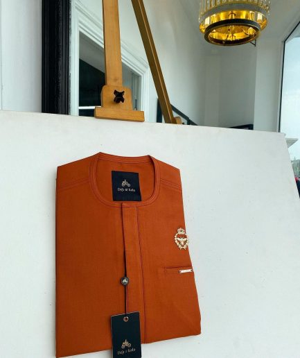 A Salamander orange, tiny flap with a gold queen bee crown details African traditional senator Kaftan native