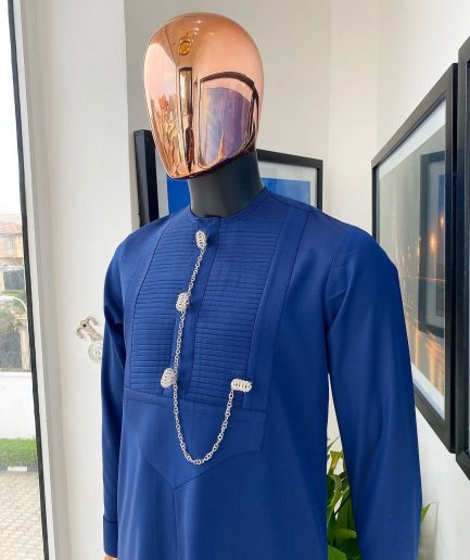 A Navy blue men’s Etibo with sliver accessories detailing.