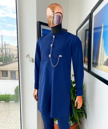 A Navy blue men’s Etibo with sliver accessories detailing.