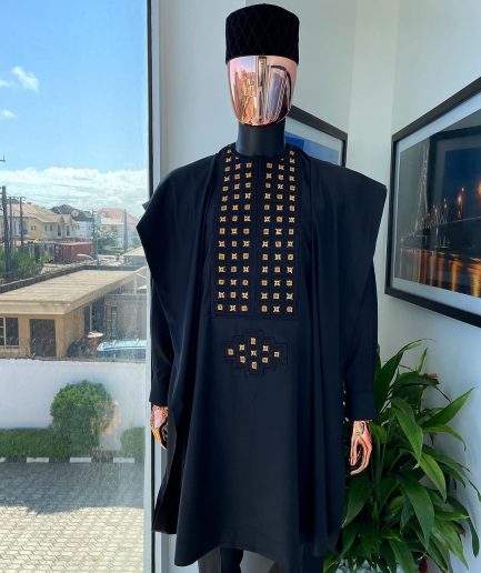 A charcoal black, connected square embroidery design with matching gold and red Swarovski stone details agbada