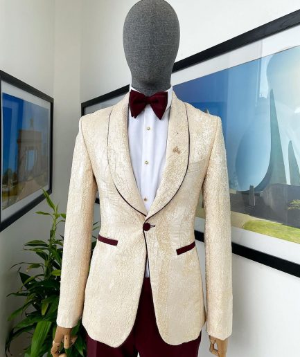 A “Mandarin” dispersed gold ruffle pattern burgundy shawl lapel jacquard suit