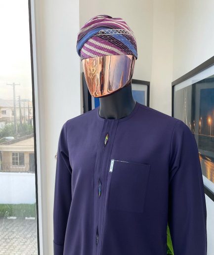 An eggplant purple flap with paisley lining details, African traditional senator kaftan native