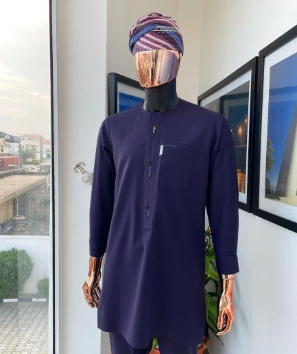 An eggplant purple flap with paisley lining details, African traditional senator kaftan native