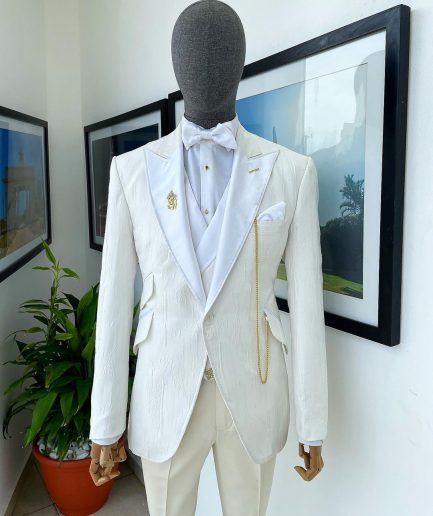 An Ivory white tear drop pattern jacquard hand picked peak lapel Suit.
