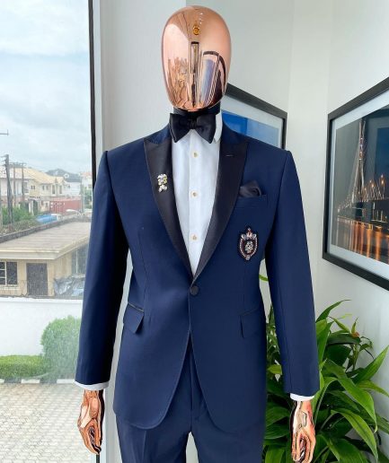 A Classic Navy Blue, Peak Lapel Tuxedo Suit