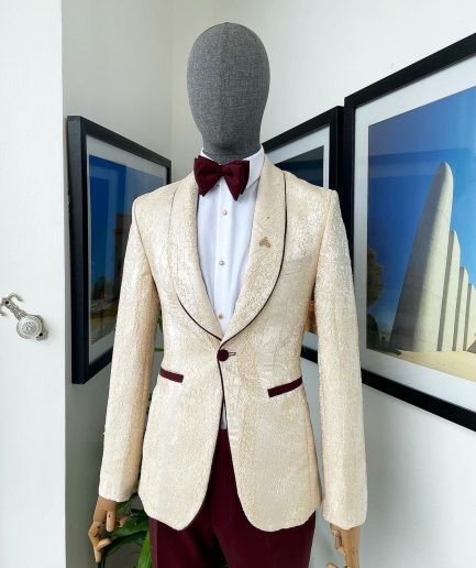 A “Mandarin” dispersed gold ruffle pattern burgundy shawl lapel jacquard suit