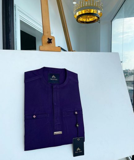 An eggplant purple, front flap and a 2 combat pocket African traditional senator kaftan native.