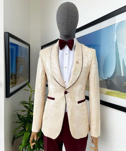 A “Mandarin” dispersed gold ruffle pattern burgundy shawl lapel jacquard suit