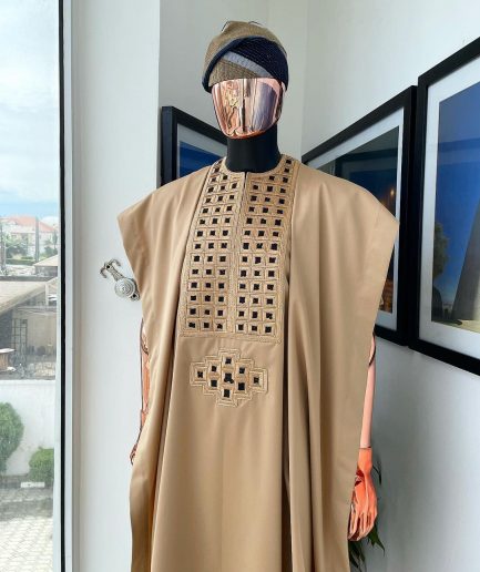 A Tan Brown, Connected Square Embroidery Design with Black Detailing Agbada