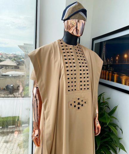 A Tan Brown, Connected Square Embroidery Design with Black Detailing Agbada