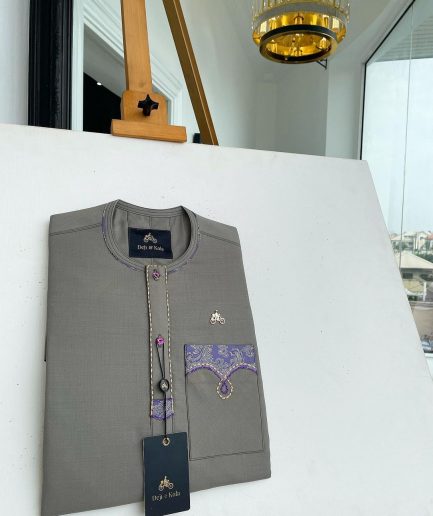 A Fossil Grey, mixed purple Swarovski buttons, vertical flap, knitted embrodery, matching paisley detailing