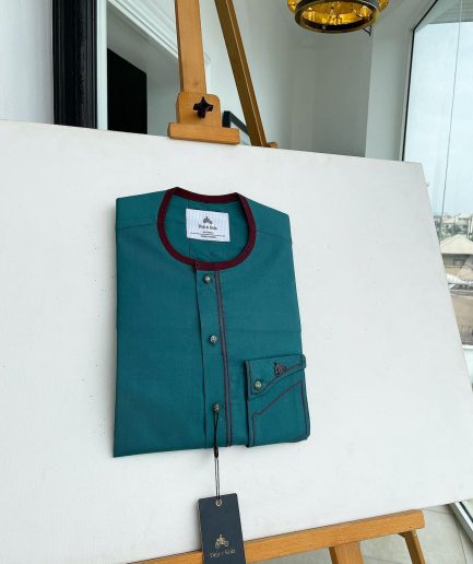 A Sacramento green, burgundy detailing, mixed-colour button details African traditional senator Kaftan native