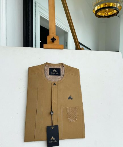 A Peanut Brown, embroidery patch pocket, vertical flap with Swarovski button detailing African traditional senator kaftan native.