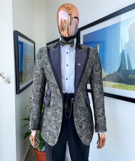 A grey floral jacquard peak lapel with black silk taping tuxedo suit