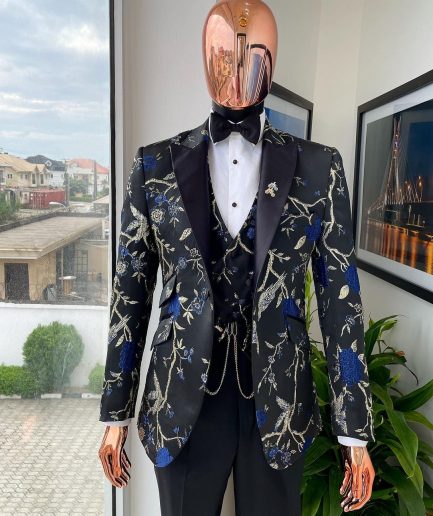 A Gold, black, and blue peak lapel, raven, and forest metallic pattern jacquard Suit