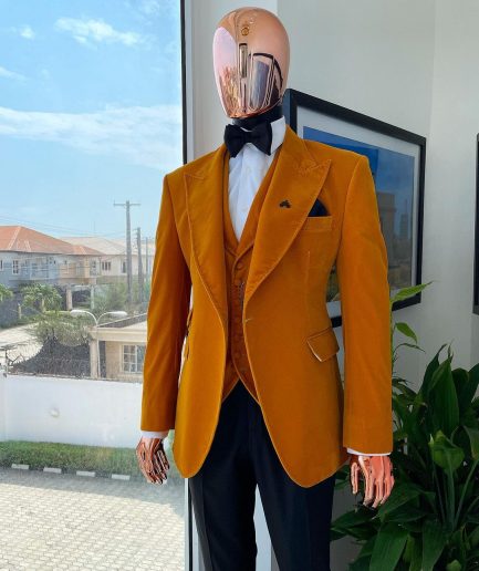 A Hand knitted soaked Italian velvet ochre yellow peak lapel suit