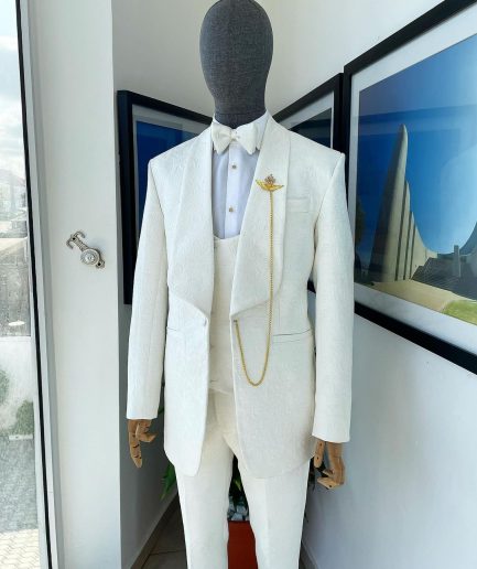 An Ivory white Reloaded “celestial” shawl lapel floral jacquard tuxedo suit.