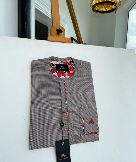A Dark brown windowpane check, cross-details front flap, and sliding patch pocket African traditional kaftan native