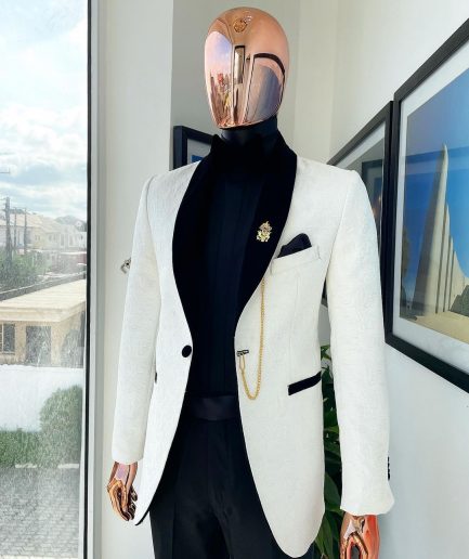 An Ivory white shawl lapel floral jacquard suit.