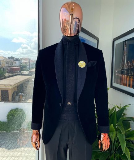 A monochrome charcoal black shawl lapel soaked Italian velvet tuxedo suit