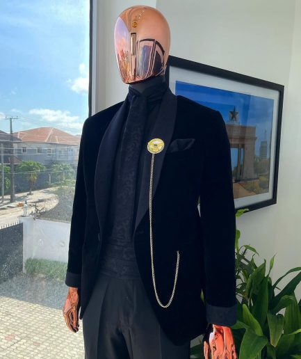 A monochrome charcoal black shawl lapel soaked Italian velvet tuxedo suit