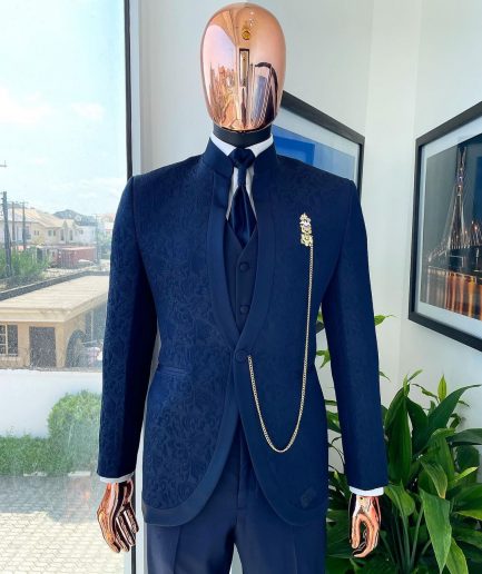A Reloaded “Pope” navy blue single button bishop neck suit