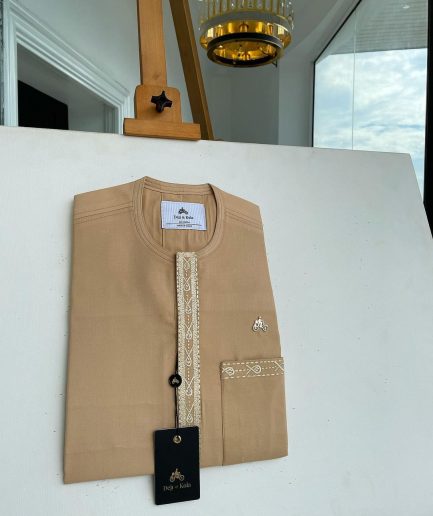 A Tan brown, embroidery front flap, and patch pocket African traditional kaftan native