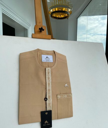 A Tan brown, embroidery front flap, and patch pocket African traditional kaftan native