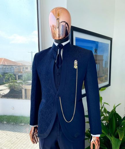 A Reloaded “Pope” navy blue single button bishop neck suit