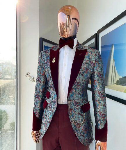 A floral paisley mahogamy red soaked Italian velvet peak lapel suit