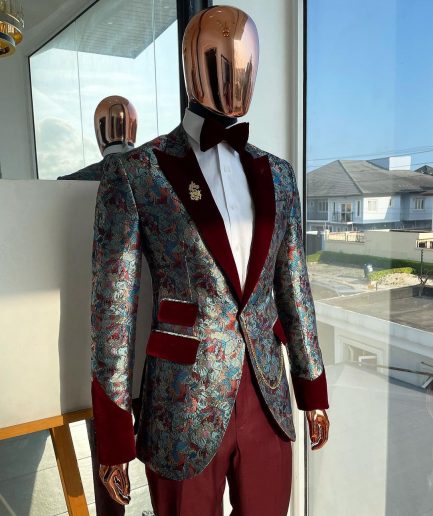 A floral paisley mahogamy red soaked Italian velvet peak lapel suit