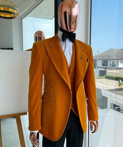 A Hand knitted soaked Italian velvet ochre yellow peak lapel suit