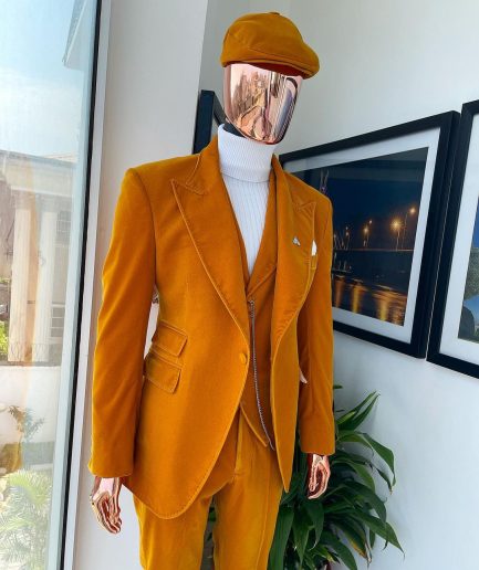 A reloaded monochrome “peaky blinders” hand knitted soaked Italian velvet ochre yellow peak lapel suit