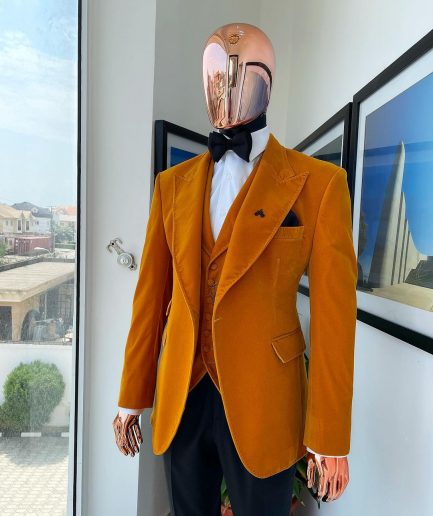 A Hand knitted soaked Italian velvet ochre yellow peak lapel suit