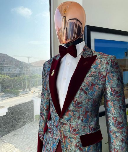 A floral paisley mahogamy red soaked Italian velvet peak lapel suit