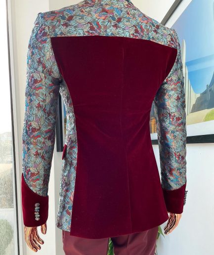 A floral paisley mahogamy red soaked Italian velvet peak lapel suit