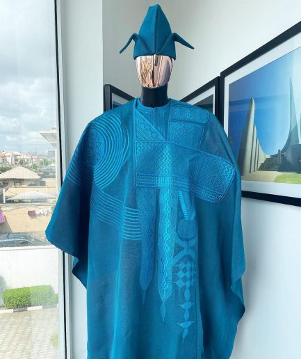 A Cerulean blue royal embroidery design agbada, dashiki, “abeti Aja” matching hat & sokoto