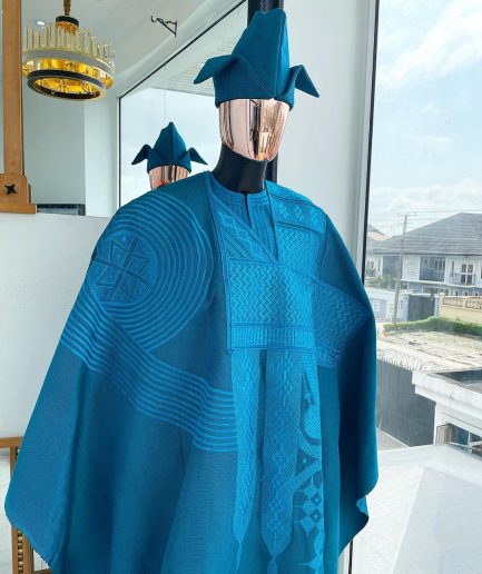 A Cerulean blue royal embroidery design agbada, dashiki, “abeti Aja” matching hat & sokoto