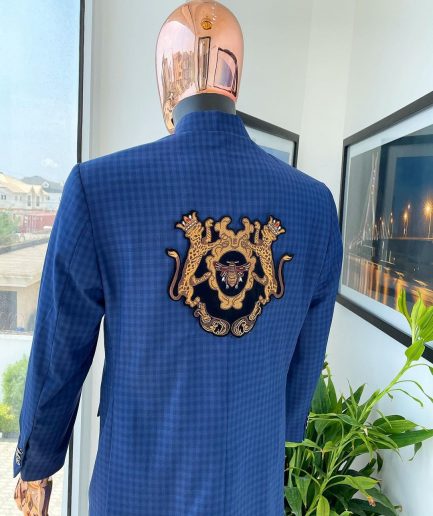 An Indigo and azure blue shepherd’s check “preacher” double breasted safari suit