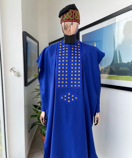 An Azure blue, connected square embroidery design with gold treading & matching Swarovski stone details agbada