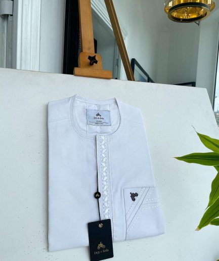 A white front flap with impossible lane embroidery details African traditional senator Kaftan