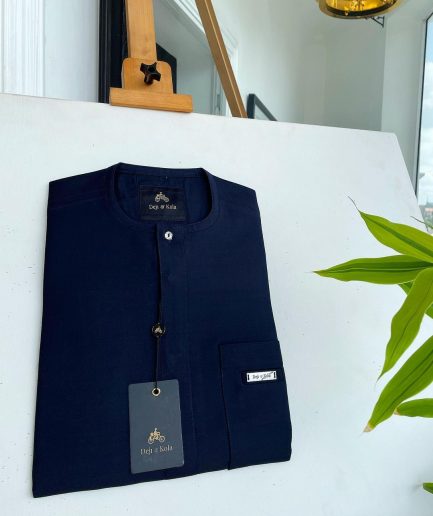 A midnight blue front flap with a clear view Swarovski button detail African traditional senator Kaftan native