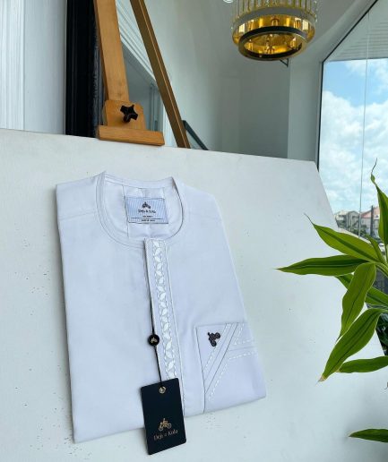 A white front flap with impossible lane embroidery details African traditional senator Kaftan