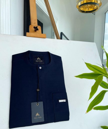 A midnight blue front flap with a clear view Swarovski button detail African traditional senator Kaftan native