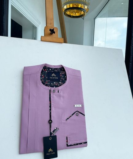 A lavender-purple invisible flap with an invisible pocket, paisley, and Swarovski button details African traditional senator Kaftan native