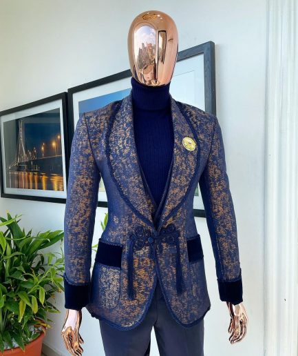 The “Samurai” Shawl and; straight cut lapel, hand woven Chinese buttons, tapin with soaked Italian velvet detailing tuxedo suit